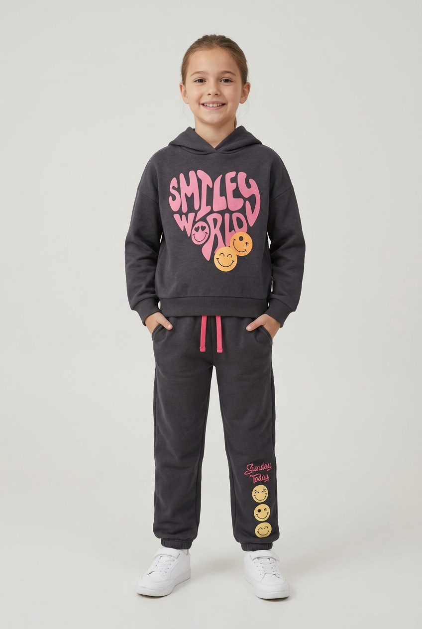 AI-generated kid model wearing charcoal smiley graphic hoodie and matching trousers